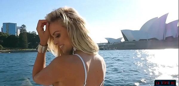  Busty blonde MILF stripping naked while on the water